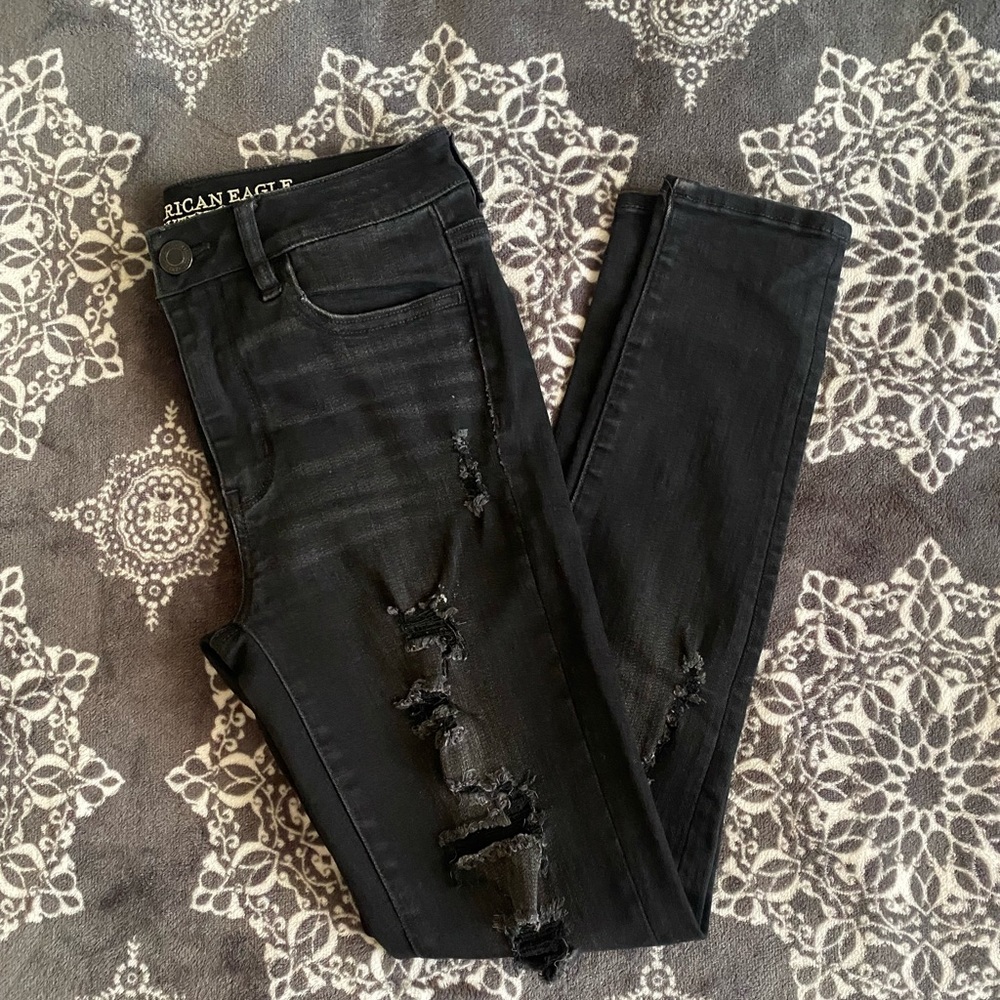 Hi-rise black distressed jeans